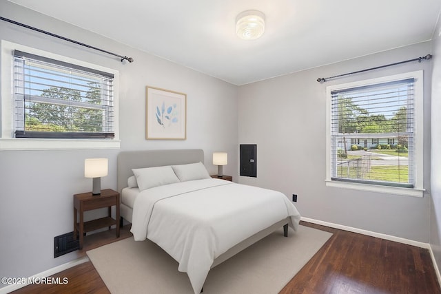6 Redwood Rd, Howell, NJ 07731 - bedroom with baseboards and dark wood finished floors