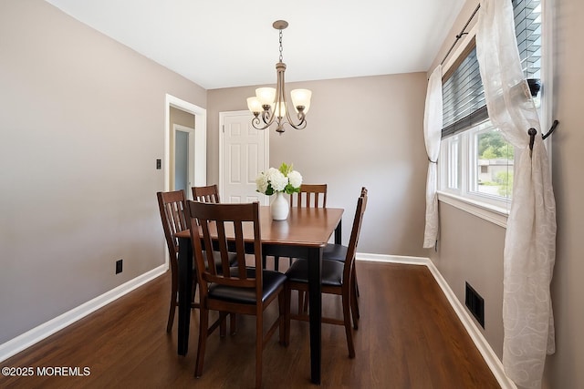 6 Redwood Rd, Howell, NJ 07731 - dining area featuring a chandelier and wood finished floors