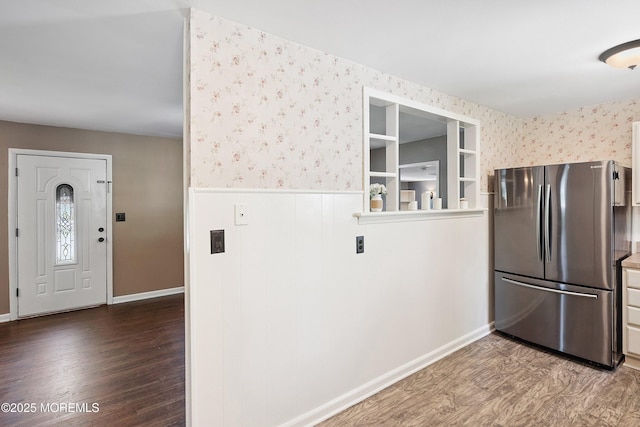 6 Redwood Rd, Howell, NJ 07731 - kitchen featuring freestanding refrigerator, wallpapered walls, wainscoting, and wood finished floors