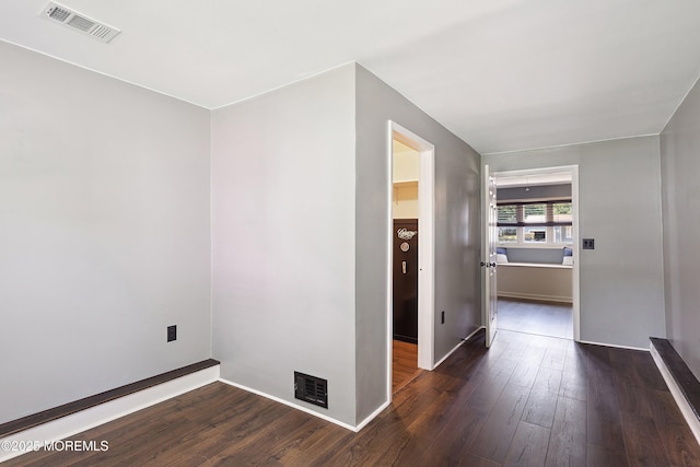 6 Redwood Rd, Howell, NJ 07731 - unfurnished room featuring dark wood-type flooring