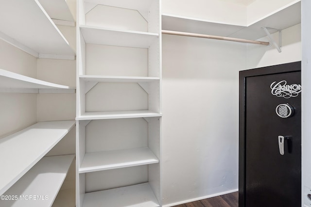 6 Redwood Rd, Howell, NJ 07731 - walk in closet featuring dark wood-style floors