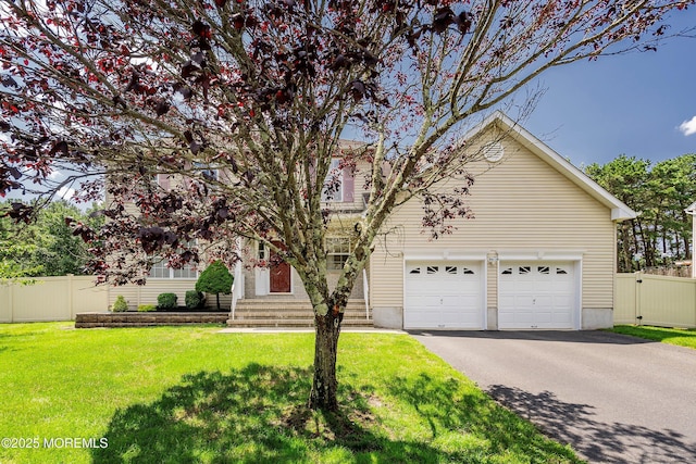 86 Lorelei Dr, Howell, NJ 07731 - view of property hidden behind natural elements with driveway and a garage