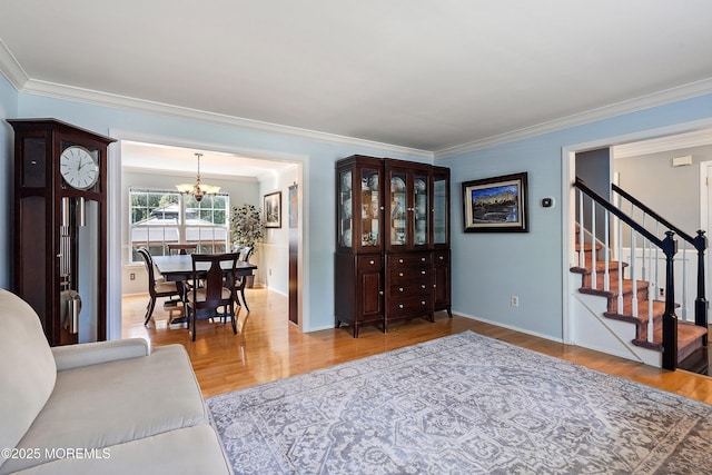 86 Lorelei Dr, Howell, NJ 07731 - foyer with a chandelier, ornamental molding, wood finished floors, and stairway