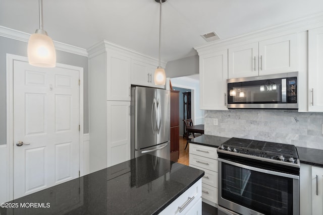 86 Lorelei Dr, Howell, NJ 07731 - kitchen with appliances with stainless steel finishes, white cabinetry, tasteful backsplash, dark stone counters, and hanging light fixtures