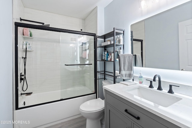 86 Lorelei Dr, Howell, NJ 07731 - bathroom featuring vanity, enclosed tub / shower combo, and wood finished floors