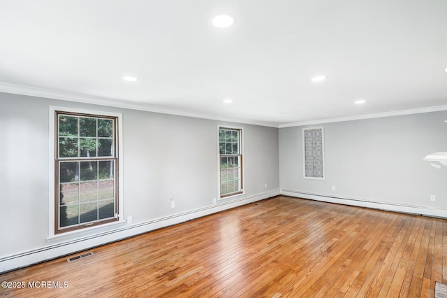 215 Parkertown Dr, Little Egg Harbor, NJ 08087 - unfurnished room featuring baseboard heating, hardwood / wood-style floors, recessed lighting, and crown molding
