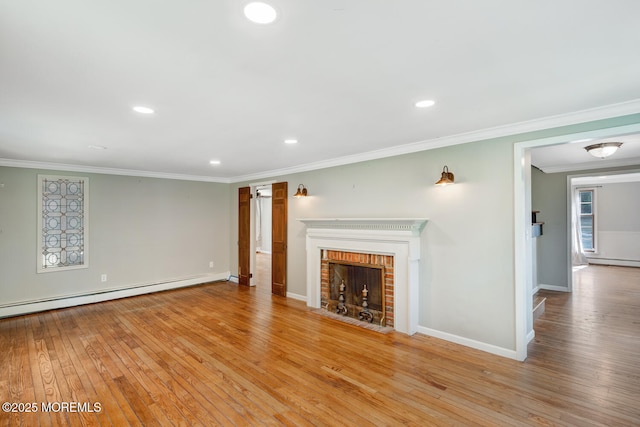 215 Parkertown Dr, Little Egg Harbor, NJ 08087 - unfurnished living room featuring baseboard heating, light wood-style flooring, crown molding, recessed lighting, and a baseboard heating unit