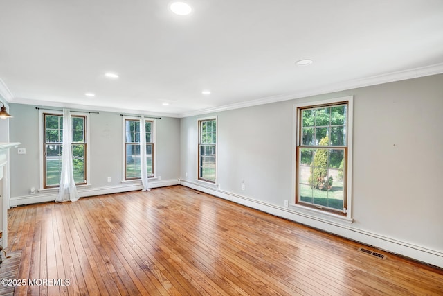 215 Parkertown Dr, Little Egg Harbor, NJ 08087 - unfurnished room featuring hardwood / wood-style floors, crown molding, a baseboard radiator, recessed lighting, and a fireplace