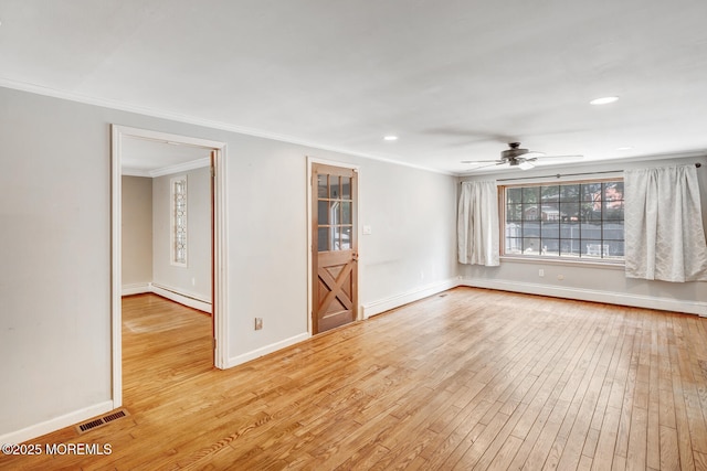 215 Parkertown Dr, Little Egg Harbor, NJ 08087 - empty room with light wood-style floors, crown molding, a ceiling fan, baseboard heating, and a baseboard radiator