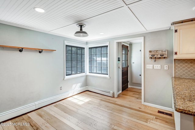 215 Parkertown Dr, Little Egg Harbor, NJ 08087 - unfurnished dining area featuring baseboard heating, light wood finished floors, and recessed lighting