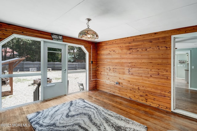 215 Parkertown Dr, Little Egg Harbor, NJ 08087 - unfurnished dining area with plenty of natural light, wood finished floors, and wood walls