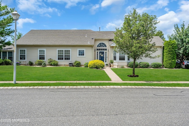 16 Vecchio Rd, Manchester, NJ 08759 - view of front of house featuring a front lawn and a shingled roof