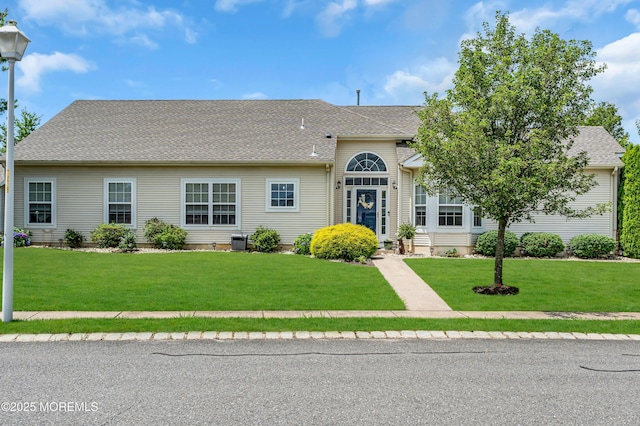 16 Vecchio Rd, Manchester, NJ 08759 - view of front of house with a front yard and a shingled roof