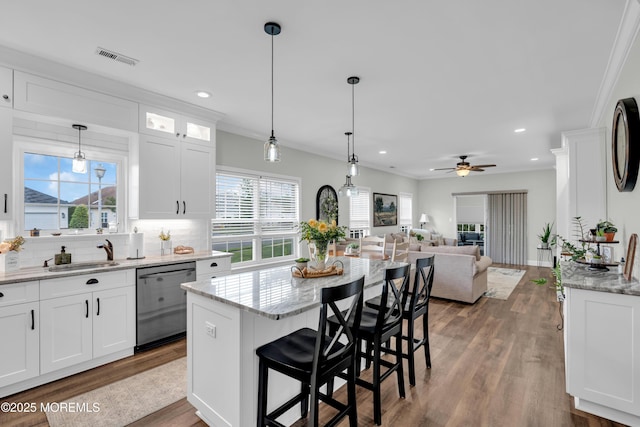 16 Vecchio Rd, Manchester, NJ 08759 - kitchen featuring dishwasher, light stone counters, white cabinets, ceiling fan, and recessed lighting