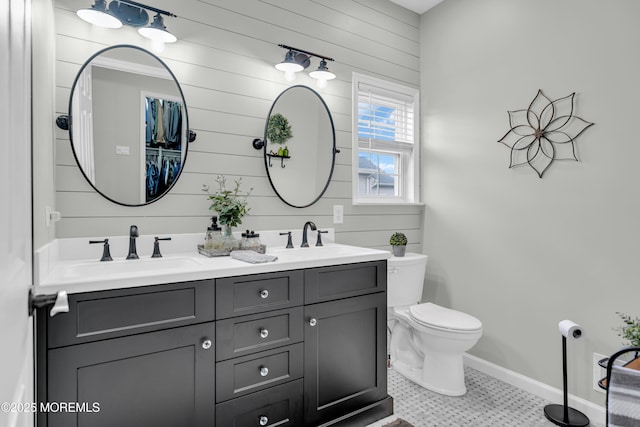 16 Vecchio Rd, Manchester, NJ 08759 - bathroom featuring double vanity and wood walls