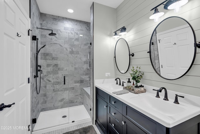 16 Vecchio Rd, Manchester, NJ 08759 - bathroom with a shower stall, double vanity, and recessed lighting