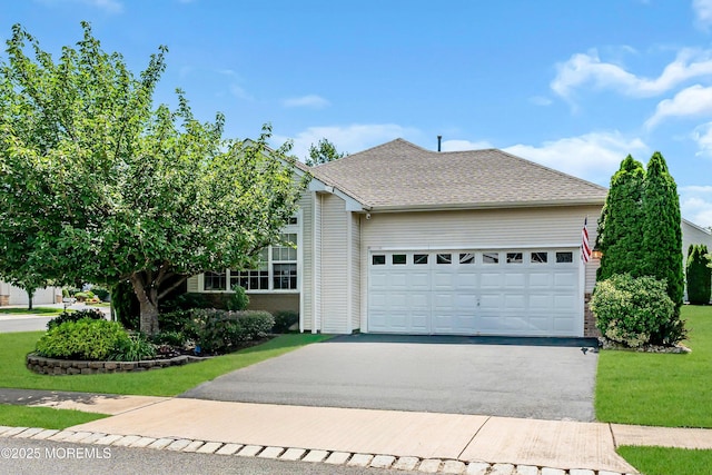 16 Vecchio Rd, Manchester, NJ 08759 - obstructed view of property featuring driveway, a garage, a front yard, and a shingled roof