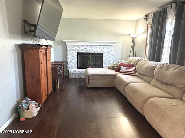 2711 2nd Ave, Toms River, NJ 08753 - living area featuring dark wood finished floors and a fireplace