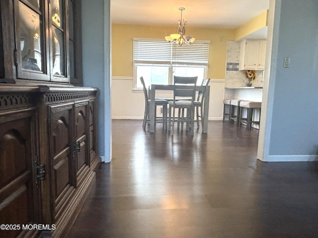 2711 2nd Ave, Toms River, NJ 08753 - dining room with a chandelier and dark wood-style floors