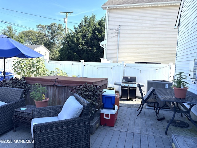 2711 2nd Ave, Toms River, NJ 08753 - wooden terrace with a hot tub, area for grilling, a fenced backyard, and a gate