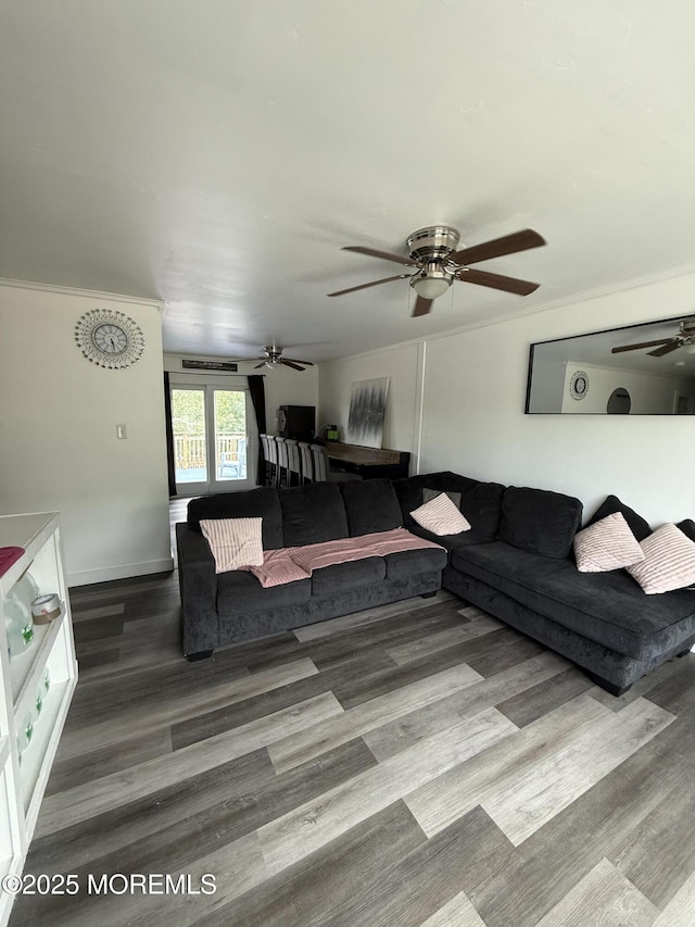 153 Schooner Ave, Barnegat, NJ 08005 - living area with a ceiling fan, wood finished floors, and ornamental molding