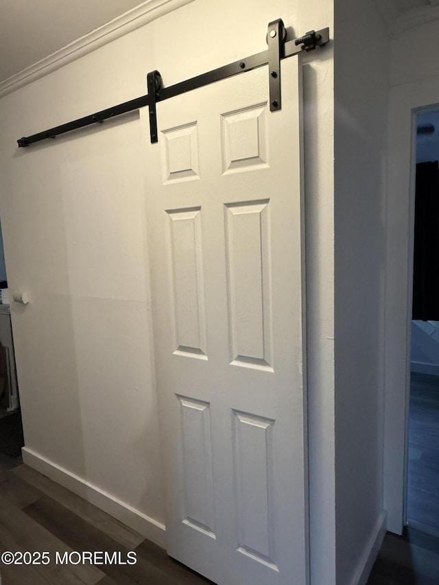 153 Schooner Ave, Barnegat, NJ 08005 - detailed view of a barn door and wood finished floors