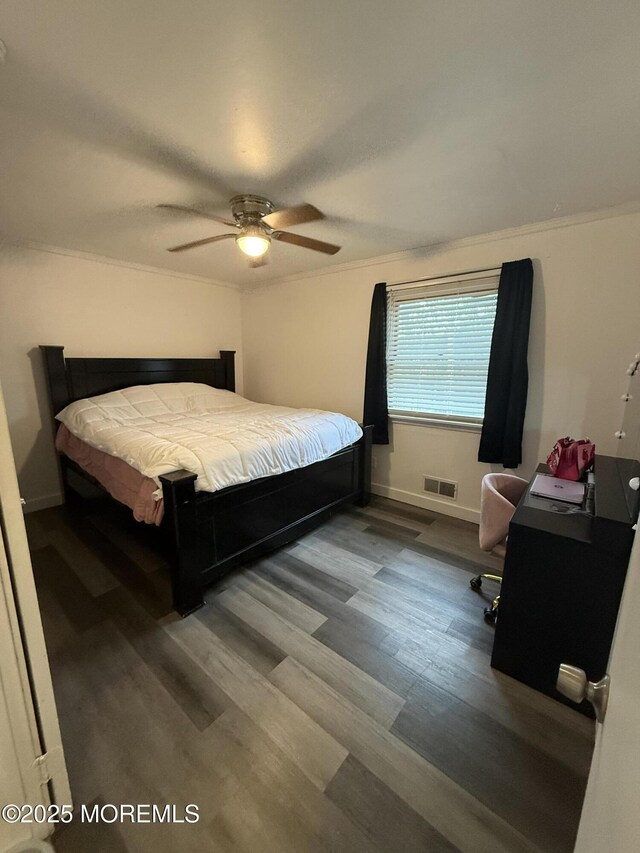 153 Schooner Ave, Barnegat, NJ 08005 - bedroom with wood finished floors, crown molding, and ceiling fan