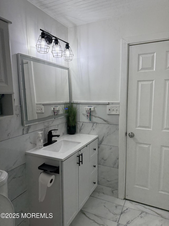 153 Schooner Ave, Barnegat, NJ 08005 - bathroom with vanity, marble finish floors, and tile walls