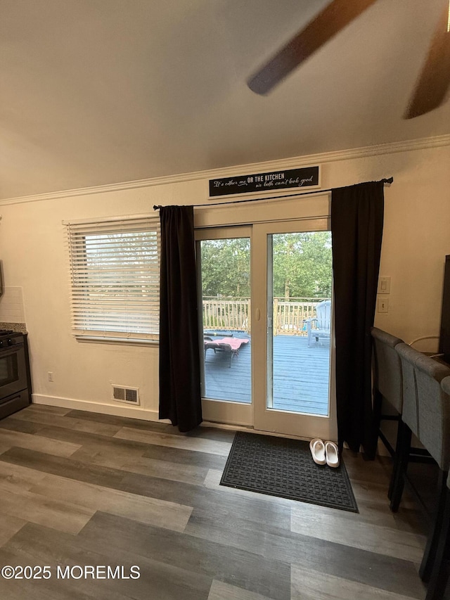 153 Schooner Ave, Barnegat, NJ 08005 - entryway featuring crown molding and wood finished floors