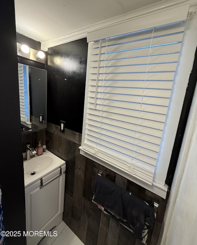 153 Schooner Ave, Barnegat, NJ 08005 - bathroom featuring vanity, wooden walls, wainscoting, and ornamental molding