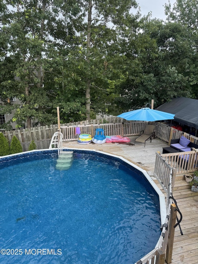 153 Schooner Ave, Barnegat, NJ 08005 - view of swimming pool featuring a fenced backyard and a wooden deck