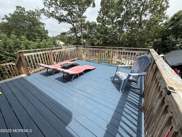 153 Schooner Ave, Barnegat, NJ 08005 - wooden terrace with view of wooded area