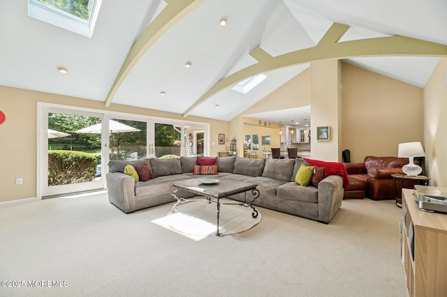 2 Derby Ln, East Brunswick, NJ 08816 - living area featuring a skylight, light carpet, high vaulted ceiling, healthy amount of natural light, and beam ceiling