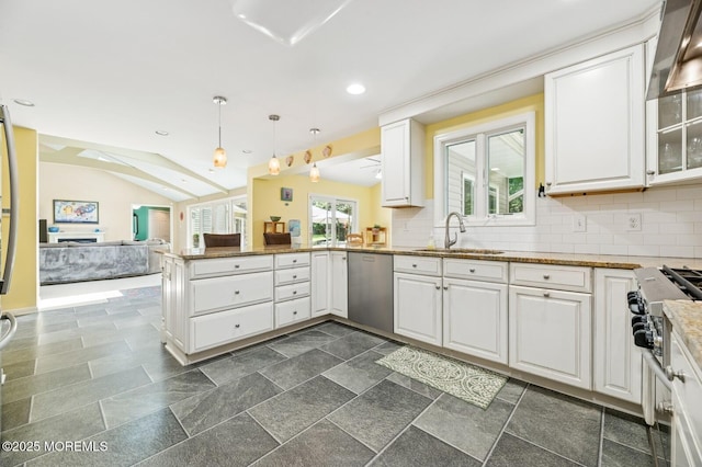 2 Derby Ln, East Brunswick, NJ 08816 - kitchen featuring stainless steel appliances, white cabinetry, a peninsula, open floor plan, and stone countertops
