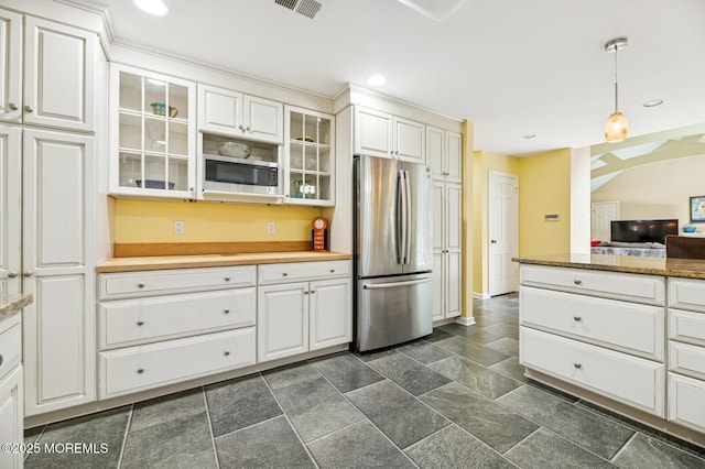 2 Derby Ln, East Brunswick, NJ 08816 - kitchen featuring appliances with stainless steel finishes, white cabinetry, glass insert cabinets, hanging light fixtures, and recessed lighting
