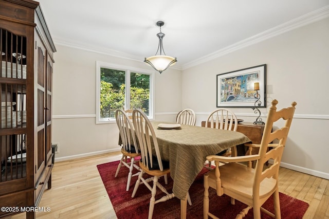 2 Derby Ln, East Brunswick, NJ 08816 - dining room with light wood-type flooring and ornamental molding