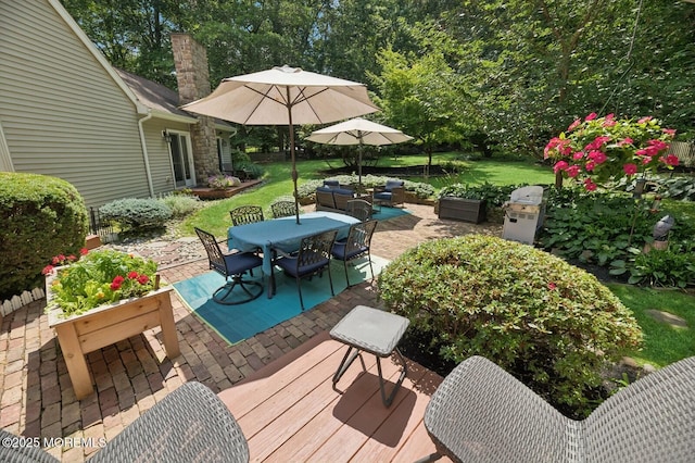 2 Derby Ln, East Brunswick, NJ 08816 - wooden deck featuring outdoor dining space, a patio area, and a lawn