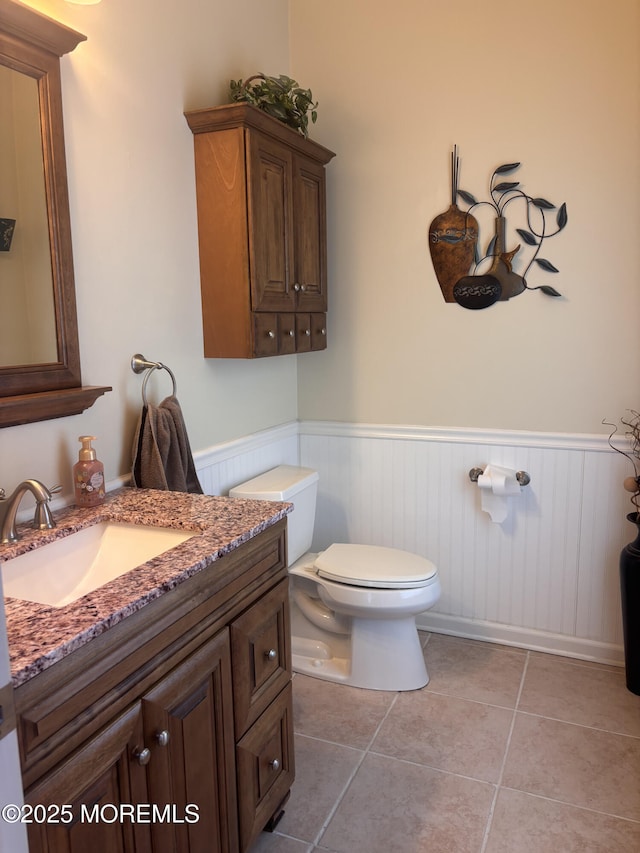 30 Gristmill Rd, Howell, NJ 07731 - bathroom with wainscoting, vanity, and tile patterned flooring