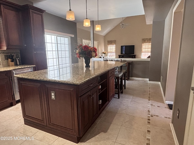 30 Gristmill Rd, Howell, NJ 07731 - kitchen with healthy amount of natural light, light tile patterned floors, stainless steel dishwasher, and lofted ceiling