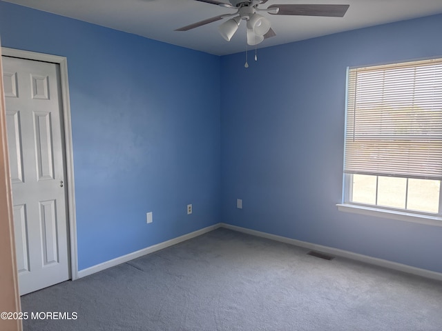 30 Gristmill Rd, Howell, NJ 07731 - carpeted empty room with ceiling fan and baseboards