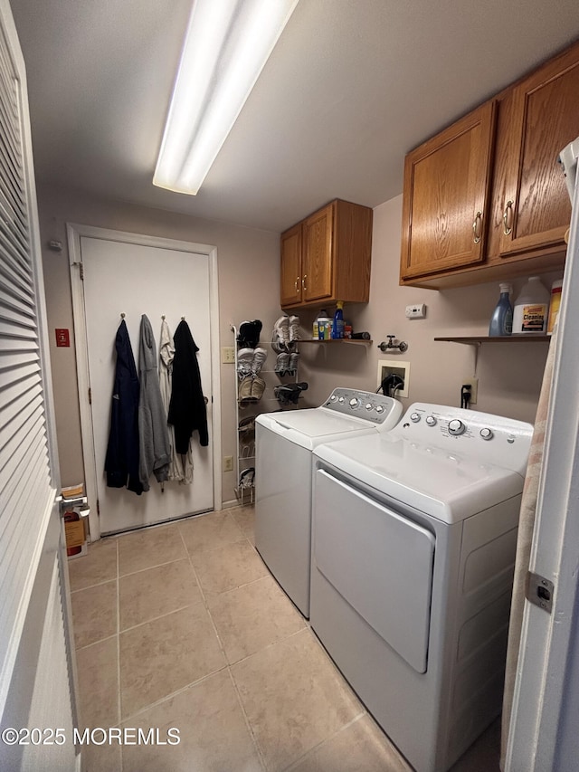 30 Gristmill Rd, Howell, NJ 07731 - laundry room featuring cabinet space, independent washer and dryer, and light tile patterned floors