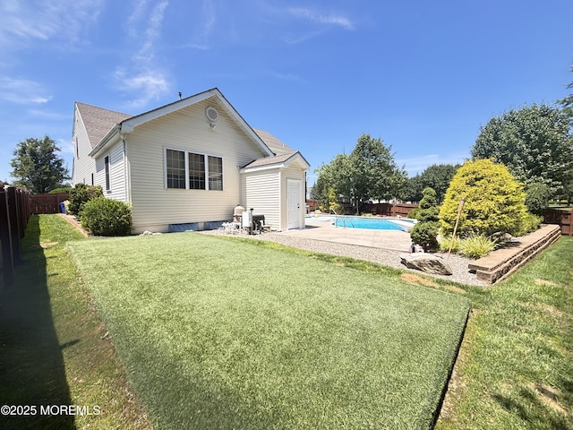 30 Gristmill Rd, Howell, NJ 07731 - back of house featuring a fenced backyard and roof with shingles