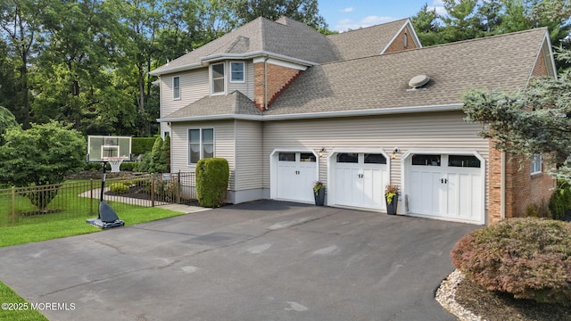 8 Shadowbrook Dr, Colts Neck, NJ 07722 - view of property exterior with driveway, an attached garage, a shingled roof, and brick siding