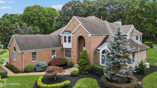 8 Shadowbrook Dr, Colts Neck, NJ 07722 - traditional-style home with brick siding, a chimney, and roof with shingles
