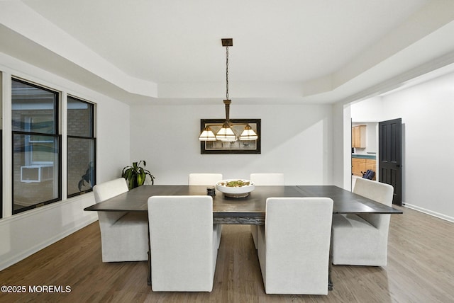 8 Shadowbrook Dr, Colts Neck, NJ 07722 - dining area featuring a raised ceiling and wood finished floors