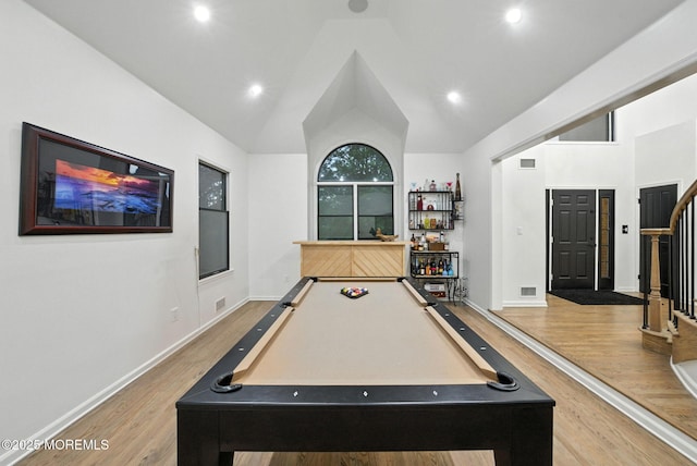 8 Shadowbrook Dr, Colts Neck, NJ 07722 - rec room with light wood-style floors, billiards table, recessed lighting, a bar, and high vaulted ceiling