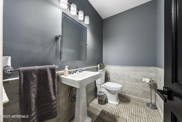 8 Shadowbrook Dr, Colts Neck, NJ 07722 - bathroom featuring wainscoting, tile walls, and tile patterned flooring