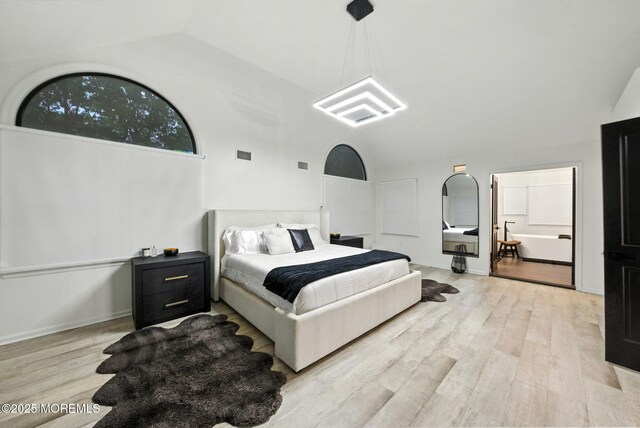 8 Shadowbrook Dr, Colts Neck, NJ 07722 - bedroom featuring light wood-style floors and high vaulted ceiling