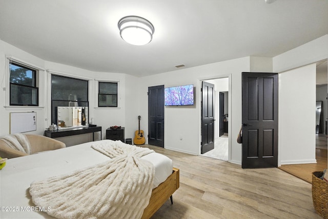 8 Shadowbrook Dr, Colts Neck, NJ 07722 - bedroom featuring light wood-type flooring and baseboards