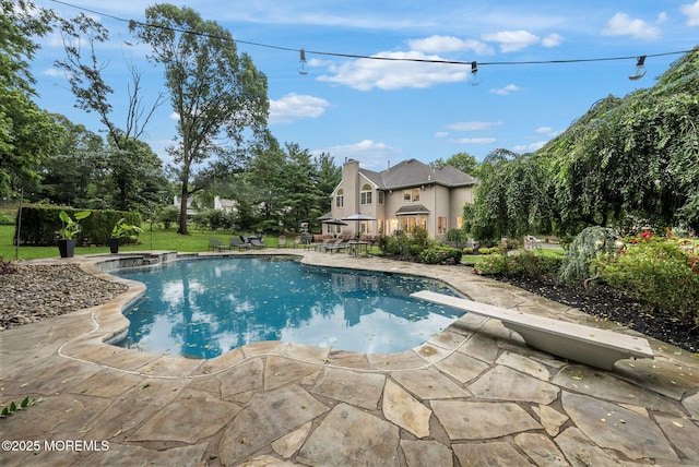 8 Shadowbrook Dr, Colts Neck, NJ 07722 - swimming pool with a diving board and a patio